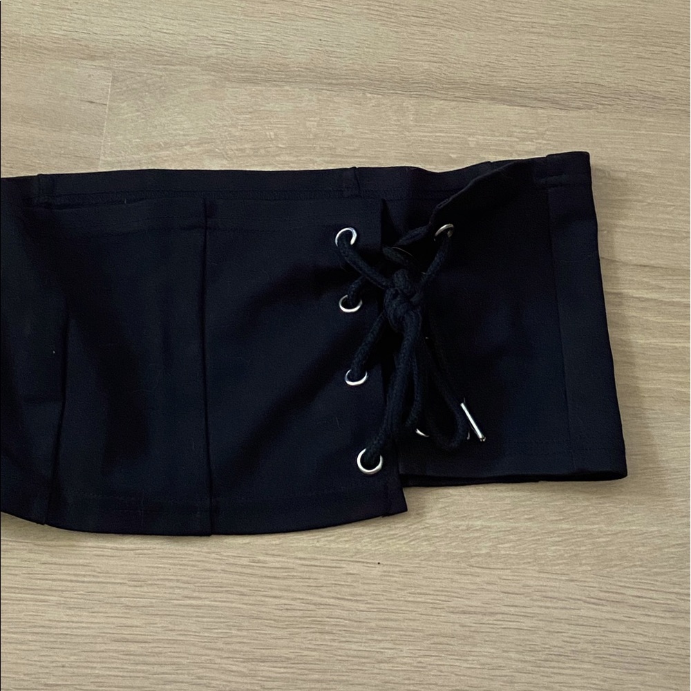 black fabric corset top